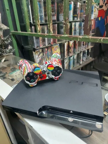 Ps3 slim cheio de jogos. Com garantia !