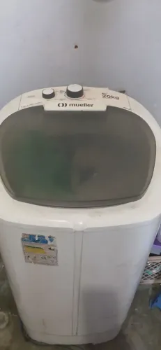 Máquina de lavar com defeito