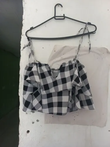 Blusa com babados tam MG