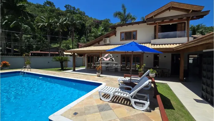 Casa sobrado com 3 dormitórios (3 suítes) à venda, 321 m² - Condomínio Mar verde - Caragua