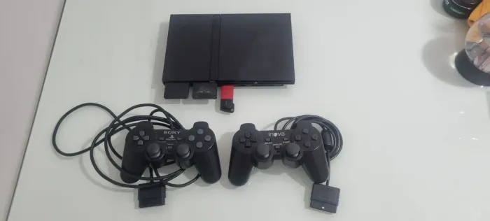 Playstation 2 slim (funcionando, sem leitor)