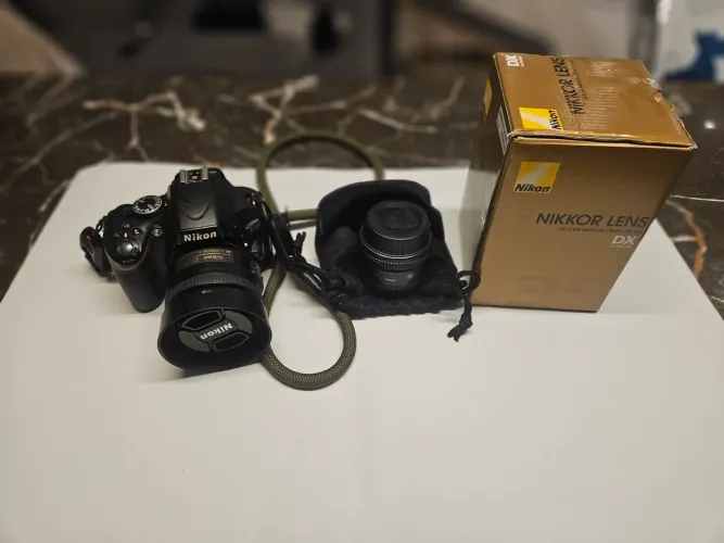 Nikon D5100 novíssima + 2 lentes