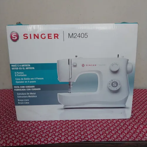Máquina de costura singer