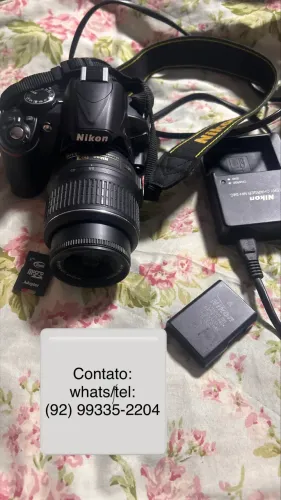 Câmera Nikon D3100 + cartão de memória, carregador e tripé