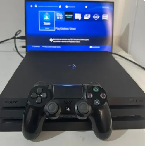 Ps4 pro 1TB +2 anos de garantia 2 controles originais e jogo