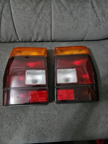 Fiat prêmio par de lanternas traseiras novas originais