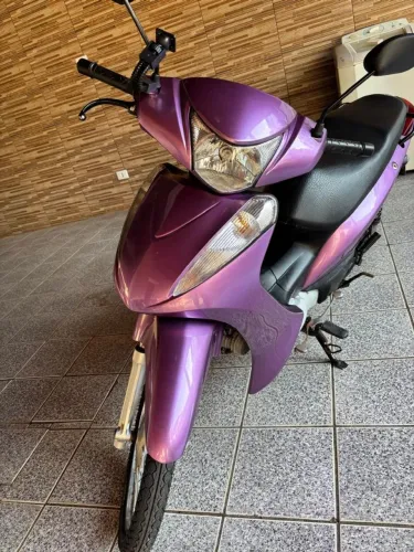 VENDO HONDA BIZ ES COM PARTIDA,CONSERVADISSIMA.... ROSA 