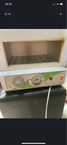 Estufa , esterilizador de alicates 