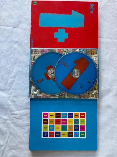 Beatles 1+ box deluxe ( 2 dvd + 1 cd ) produto oficial apple rock and roll 50 clipes