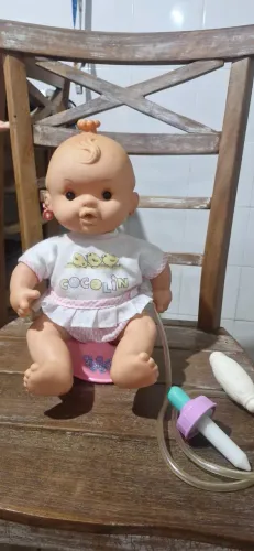 Boneca Cocolin antigo retro colecionismo com penico e mangueirinha original roupa colecao