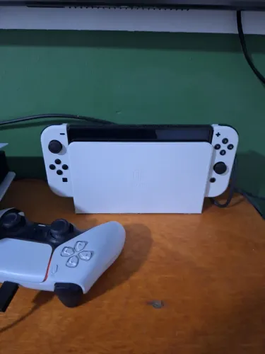 Nintendo switch oled com Mario wonder estudo troca caiaque e bike eletrica