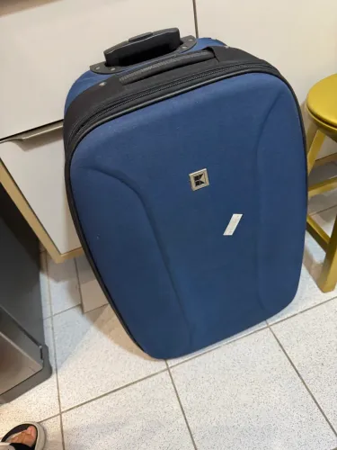Mala azul de 23 kg