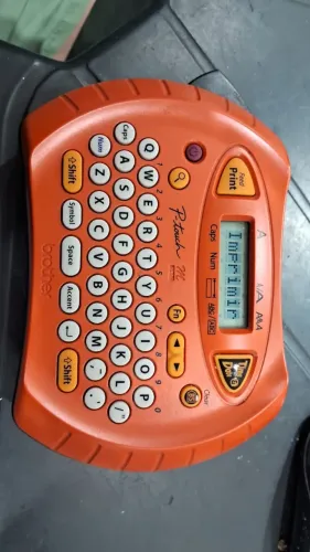 Rotulador Eletrônico Brother P-Touch PT-70 (Laranja) 
