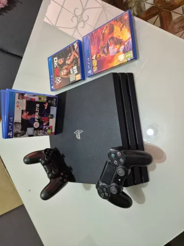 Ps4 pro 1 tb + 2 controles + 3 jogos