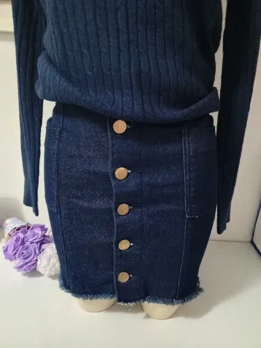 Saia tam. 36 e sweater P 15,00 cada brechó