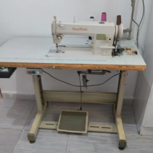 Máquina industrial de costura ?