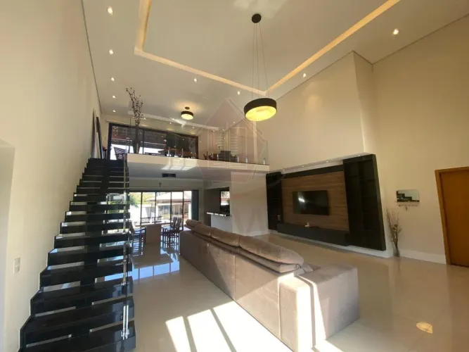 Espetacular casa em condomínio à venda em com 4 quartos, 4 suítes, 2 salas, 5 banheiros, 5