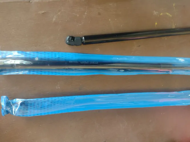 Amortecedor porta malas 65 cm.