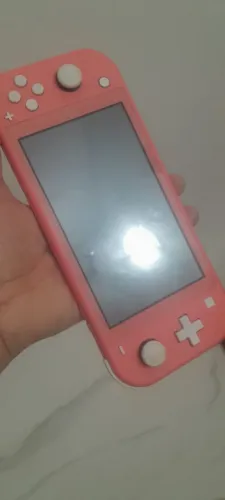 Nintendo Switch Lite (cor Coral), Entre em contato com o número que está no anúncio.