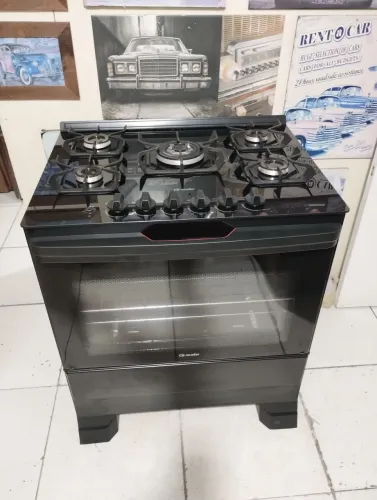 Fogão semi novo Mueller 5 bocas mesa de vidro 