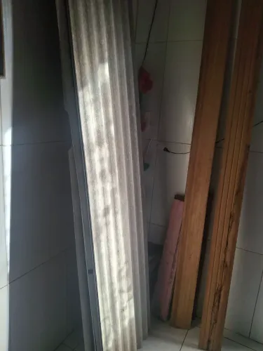 Doação telhas de ethernit e madeiras de porta