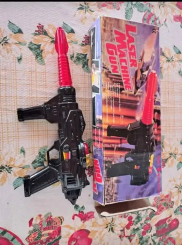 Brinquedo. Metralhadora a Laser Vibratória