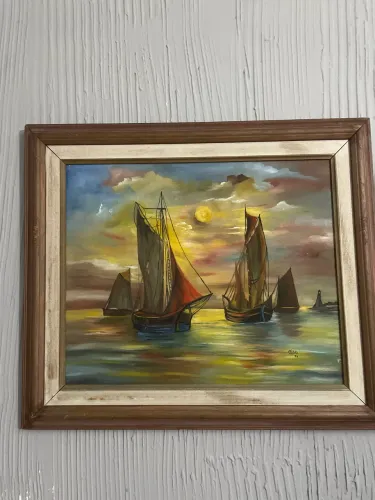 Quadro O mar e as embarcações.