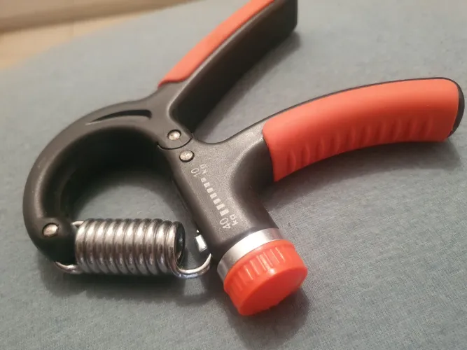 HANDGRIP seminovo 10kg a 40kg, preto e laranja