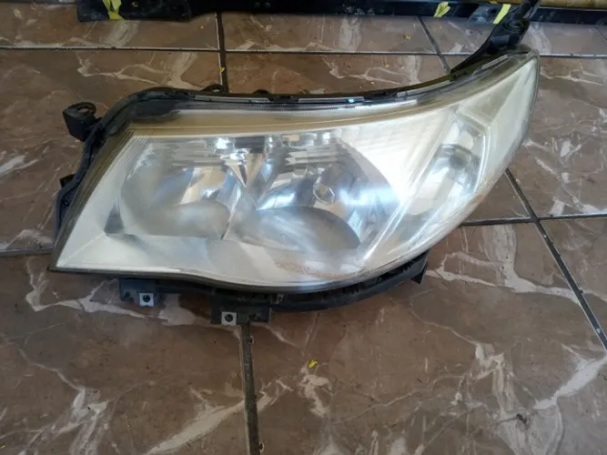Farol esquerdo Subaru Forester 2009  com Xenon 