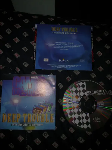 Deep Trouble exploração submarina jogo antigo PC CD coleção Games Estadão