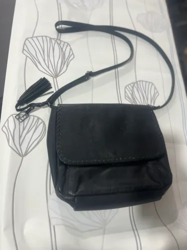 Bolsa de couro le postiche