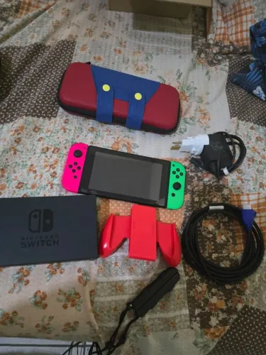 Nintendo Switch Destravado via chip + Cartão de memoria de 128gb cheio de jogos