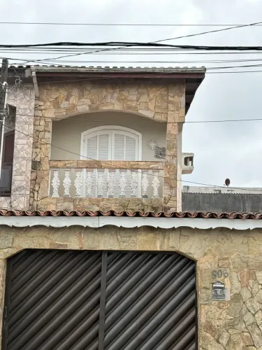 Casa para venda tem 148 metros quadrados com 4 quartos em Vila Santa Rosa - Guarujá - São