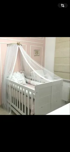 Dorcel de parede com mosquiteiro branco