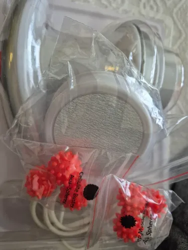 Massageador elétrico, relaxa e reduz as gordurinhas. Nove esferas.