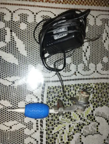 Vendo uma máquina de tatuagem 