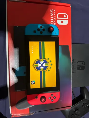 Nintendo switch desbloqueado 256gb com caixa,duas docks