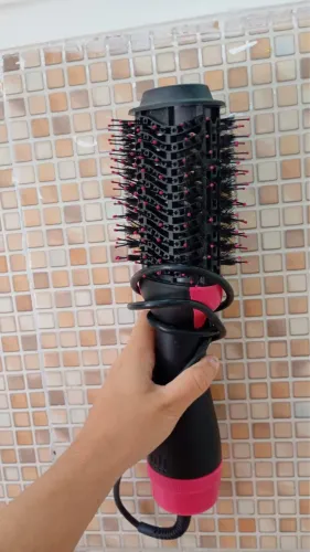 Vendo secador elétrico quente  alisadora