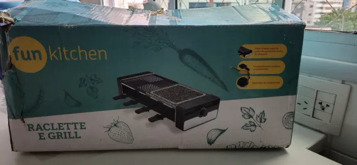Grill elétrico e raclete na caixa