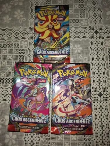 3 boosters Pokémon TCG - Caos Ascendente