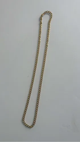 Cordão contém 29g de prata banhado a ouro 18k