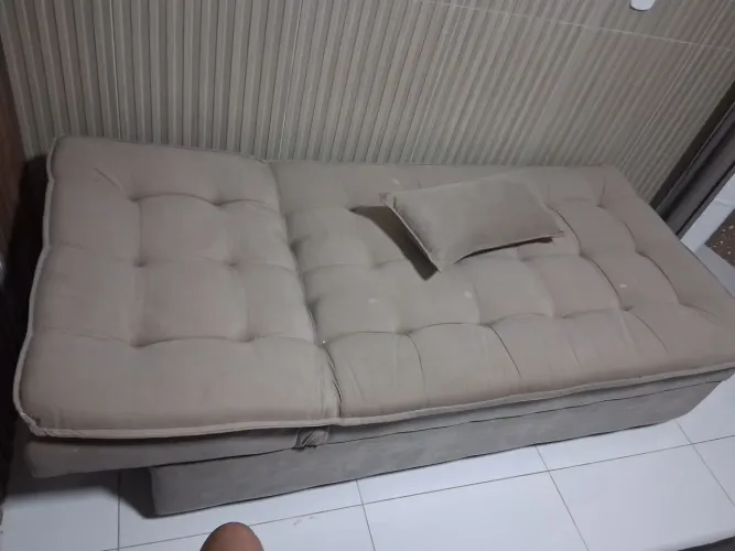 Vendo sofa tufon semi novo retratil.