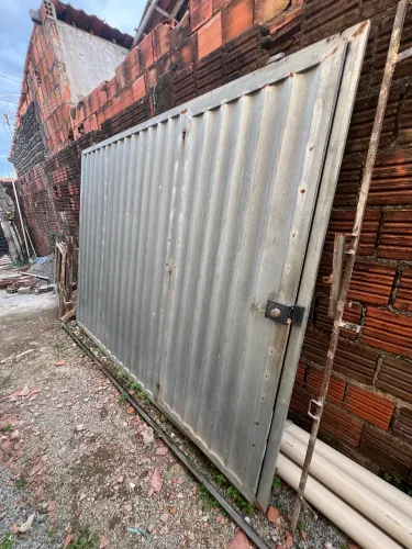 Vendo Portão de garagem+ pega ladrao de porta e janela.
