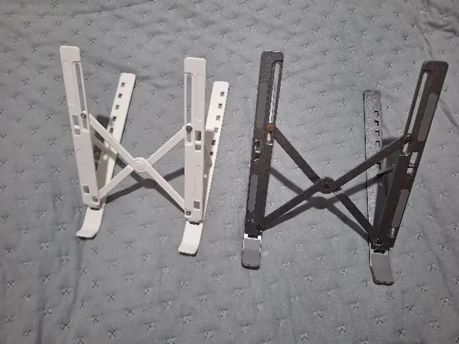 suportes articulados e dobrável para notebook. O de plástico vem de brinde!