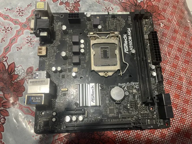 Placa-mãe ASRock H310CM-HG4 (com defeito) - para peças ou conserto