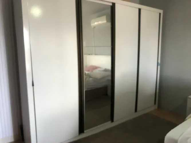 Guarda roupa casal 4 portas de correr
