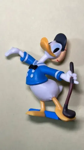 Pato Donald Jogador de Golf - miniatura altura 5 cm - p/ fãs da Disney Abril e Culturama