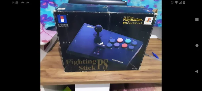 Controle Arcade na caixa.