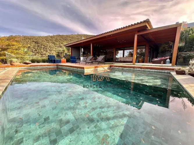 Casa com 3 dormitórios à venda, 405 m² por R$ 4.590.000,00 - Condomínio Quintas do Sol - N
