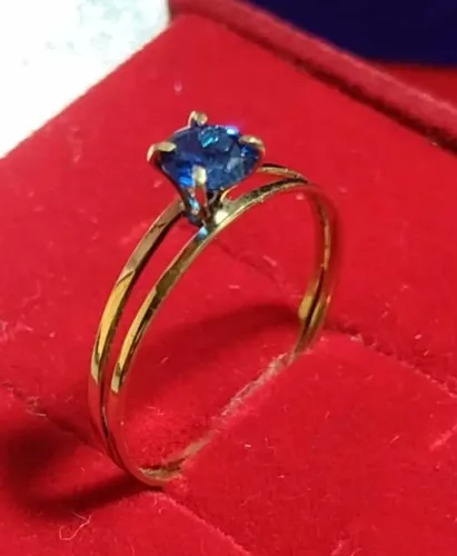 Anel Solitário Pedra Azul Zircônia 5 mm Ouro 18 Kilates Peso 1.15 Gramas Aro 1 mm Todas as
